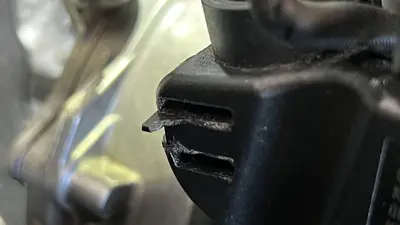 Found a broken tab on the end of the coil wiring harness connector.