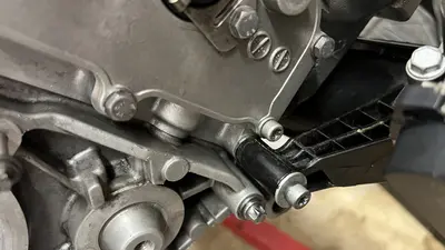 Side mount and bracket hardware on the long block.