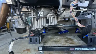 Denso starter (7596131-01) and solenoid connections — part and plug reference.