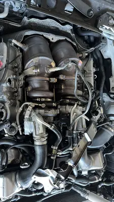 Teardown progress: bank 1 intercooler and fan out to make room up front.