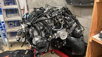 Dressed long block on the stand — assembly nearly complete.