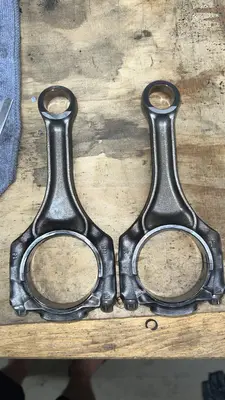 Two of the out-of-spec connecting rods I had to replace.