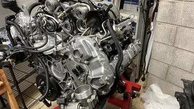 Front-right side of the long block — assembly progress on the stand.