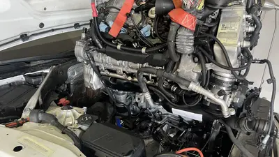 Hoist approach — front of the engine facing the radiator support.