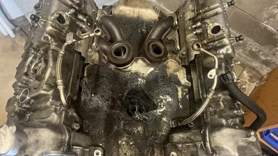 Turbos off: oily carbon crust in the hot-V valley between the banks.