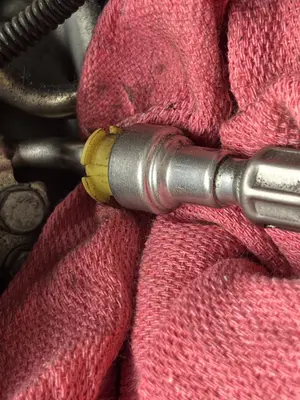 High-pressure fuel line before disconnecting.