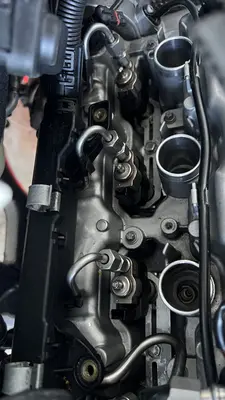 Working toward the bank 1 valve cover.
