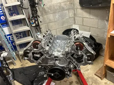 Right-side cam gears going on.