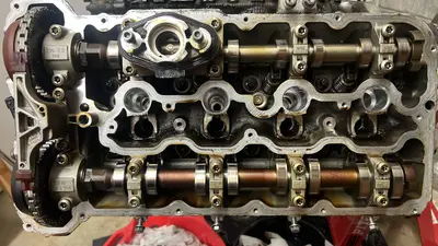 Right head — cams ready to come out for cleaning.