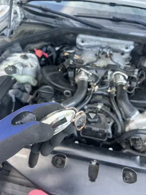 Key in hand over the open bay — first look after delivery; still looks assembled from above.