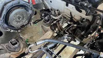 Front three-quarter of the dressed long block on the stand.