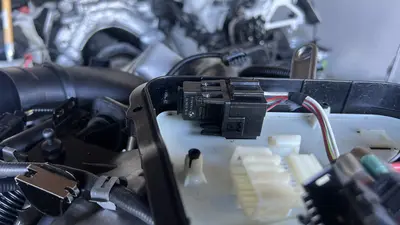 Starter and oil-filter region — clearances before the engine goes back in.